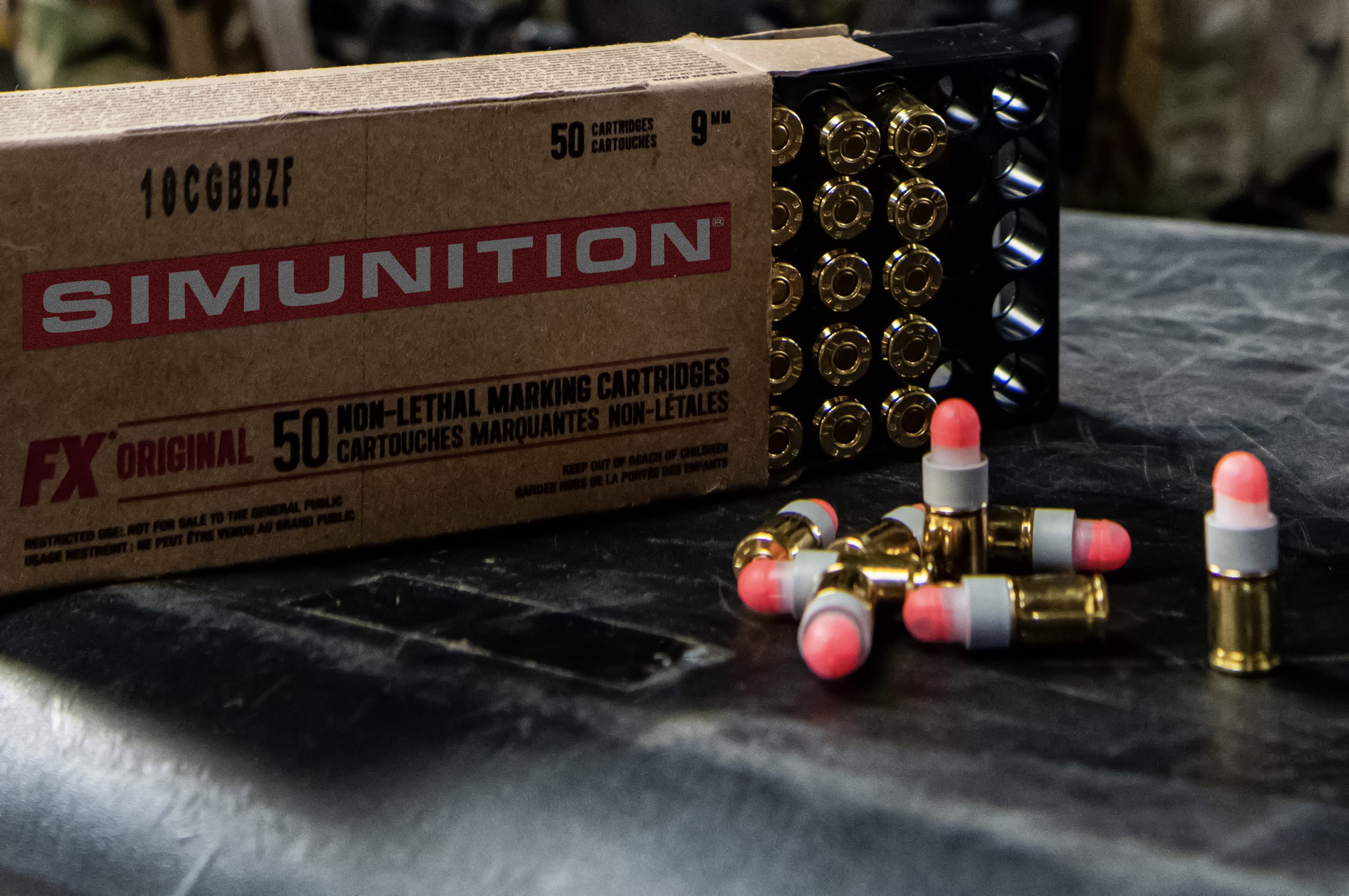A close-up image of the non-lethal making cartridges