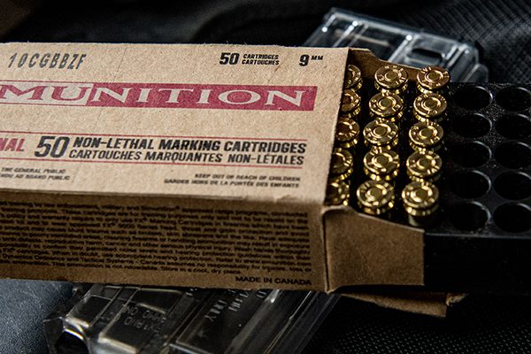 A close-up image of FX non-lethal marking cartridges in the casing